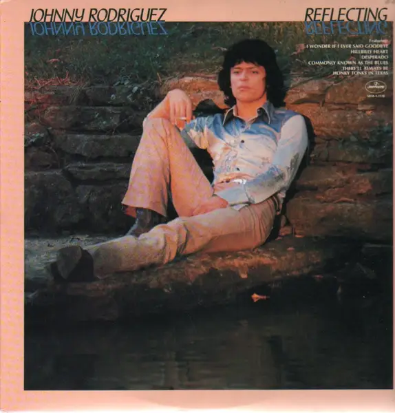 Johnny Rodriguez Reflecting