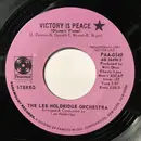 7inch Vinyl Single - The Lee Holdridge Orchestra - Victory Is Peace (Olympic Flame) / Snow Frolic - Lilac labels