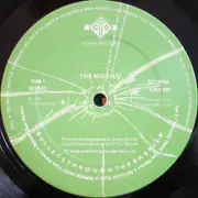 LP - The Movies - Bullets Through The Barrier