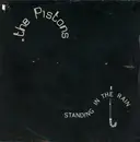 7inch Vinyl Single - The Pistons - Standing In The Rain / Raised On Rock & Roll