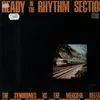 LP - The Syndromes vs Merciful Release All-Stars - Ready In The Rhythm Section