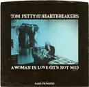 7inch Vinyl Single - Tom Petty And The Heartbreakers - A Woman In Love (It's Not Me)