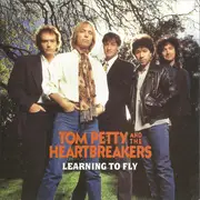 7inch Vinyl Single - Tom Petty And The Heartbreakers - Learning To Fly - Paper Labels