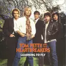 7inch Vinyl Single - Tom Petty And The Heartbreakers - Learning To Fly - Paper Labels