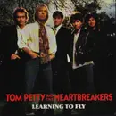 7inch Vinyl Single - Tom Petty And The Heartbreakers - Learning To Fly