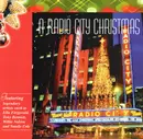 CD - Johnny Mathis, The Temptetions a.o. - A Radio City Christmas