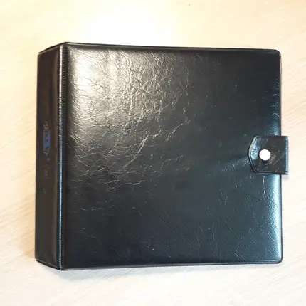 Vintage Schallplattenalbum - in schwarzer Lederoptik für 16 Singles