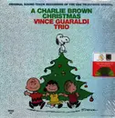 LP - Vince Guaraldi Trio - A Charlie Brown Christmas - Poster / Green Vinyl / Holographic Foil Jacket