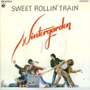 7inch Vinyl Single - Wintergarden - Sweet Rollin' Train / Au Pair Girl