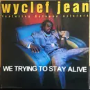 12inch Vinyl Single - Wyclef Jean Featuring Refugee Camp All Stars - We Trying To Stay Alive