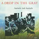 7inch Vinyl Single - A Drop In The Gray - Heartache Feeds Heartache