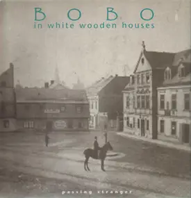 BOBO in white wodden houses - Passing Stranger