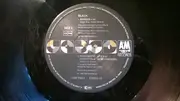 12inch Vinyl Single - Black - Here It Comes Again