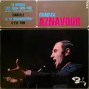 7inch Vinyl Single - Charles Aznavour - Le Monde Est Sous Nos Pas (Du Film : Week-End A Zuydcoote)