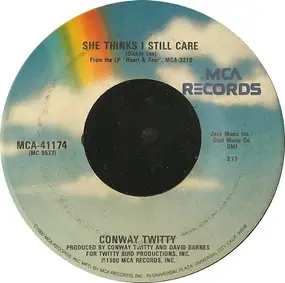 Conway Twitty - She Thinks I Still Care / I'd Just Love To Lay You Down