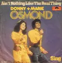 7'' - Donny & Marie Osmond - Ain't Nothing Like The Real Thing