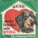 7inch Vinyl Single - Erik Schumann Und Das Orchester Josef Niessen - Hexy-Mein Dackel Mit Herz / Ein Kleiner Hund