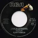 7inch Vinyl Single - Eurythmics - Love Is A Stranger / Monkey, Monkey