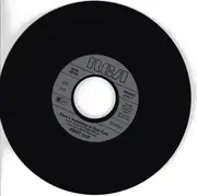 7inch Vinyl Single - First Cut - There's Something In Your Eyes