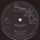 7inch Vinyl Single - Four Tops - What Is A Man