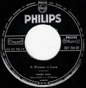 7inch Vinyl Single - Frankie Laine - A Woman In Love / Walking The Night Away - Mono