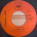 7inch Vinyl Single - Frankie Laine - A Woman In Love / Answer Me - no cover
