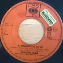 7inch Vinyl Single - Frankie Laine - A Woman In Love / Answer Me