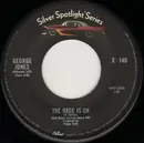 7'' - George Jones - The Race Is On / She Thinks I Still Care