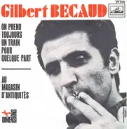 Gilbert Bécaud - On Prend Toujours Un Train Pour Quelque Part / Au Magasin D' Antiquités