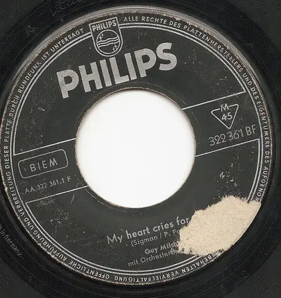 Guy Mitchell - My Heart Cries For You / The Roving Kind