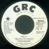 7inch Vinyl Single - Homegrown - Holly