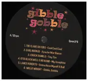 10'' - Howlin' Wolf, Otis Blackwell & His Band, The Clare Sisters a.o., - Gibble Gobble (The Return Of Blues & Rhythm, Popcorn, Exotica & Tittyshakers!)
