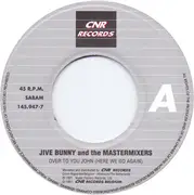 7inch Vinyl Single - Jive Bunny And The Mastermixers - Over To You John (Here We Go Again)