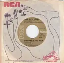 7inch Vinyl Single - John Paul Young - Standing In The Rain / I Wanna Do It With You
