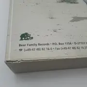 CD-Box - John Wayne / Frankie Avalon / Gene Pitney a.o. - John Wayne's West - Digibook / 10 CDs + 1 DVD + Book + Slipcase