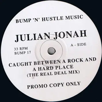 Julian Jonah - Caught Between A Rock And A Hard Place