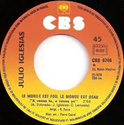 7inch Vinyl Single - Julio Iglesias - Le Monde Est Fou, Le Monde Est Beau / J'ai Besoin De Toi