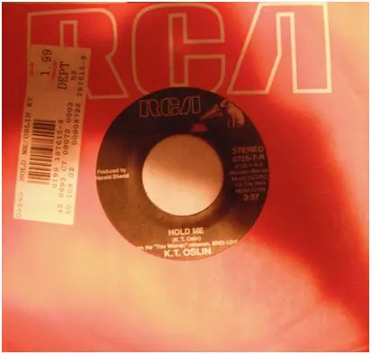 K.T. Oslin - Hold Me / She Don't Talk Like Us No More