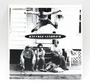 Knuckle Sandwich - Caught In The Middle
