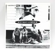 Knuckle Sandwich - Caught In The Middle
