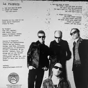 7inch Vinyl Single - La Flingue / Ornitorrincos - Punk To Cross Borders Split - Milky Clear Vinyl, Insert