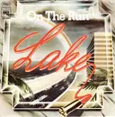 7'' - Lake - On The Run