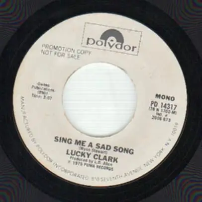 Lucky Clark - Sing Me A Sad Song