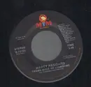 7inch Vinyl Single - Marty Haggard - Trains Make Me Lonesome / The Dawn's Early Light