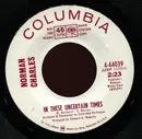 7inch Vinyl Single - Norman Charles - In These Uncertain Times / God Bless America - Promo