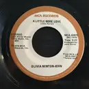 7'' - Olivia Newton-John - A Little More Love / Borrowed Time