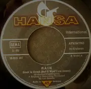 7inch Vinyl Single - Rain - Rock Is Dead (But It Won't Lie Down) / Live Passes By