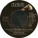 7'' - Ronnie Milsap - She Keeps The Home Fires Burning / Lost In The Fifties Tonight (In The Still Of The Night)