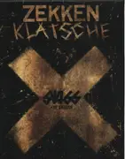 Double LP - Swiss & Die Andern - 10 Jahre Swiss + Die Andern: Best Of - Clear Vinyl, hardcover book. incl. card game