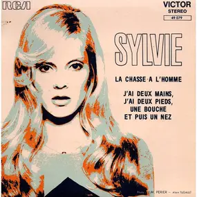 Sylvie Vartan - La Chasse A L'homme / J'ai Deux Mains, J'ai Deux Pieds, Une Bouche Et Puis Un Nez